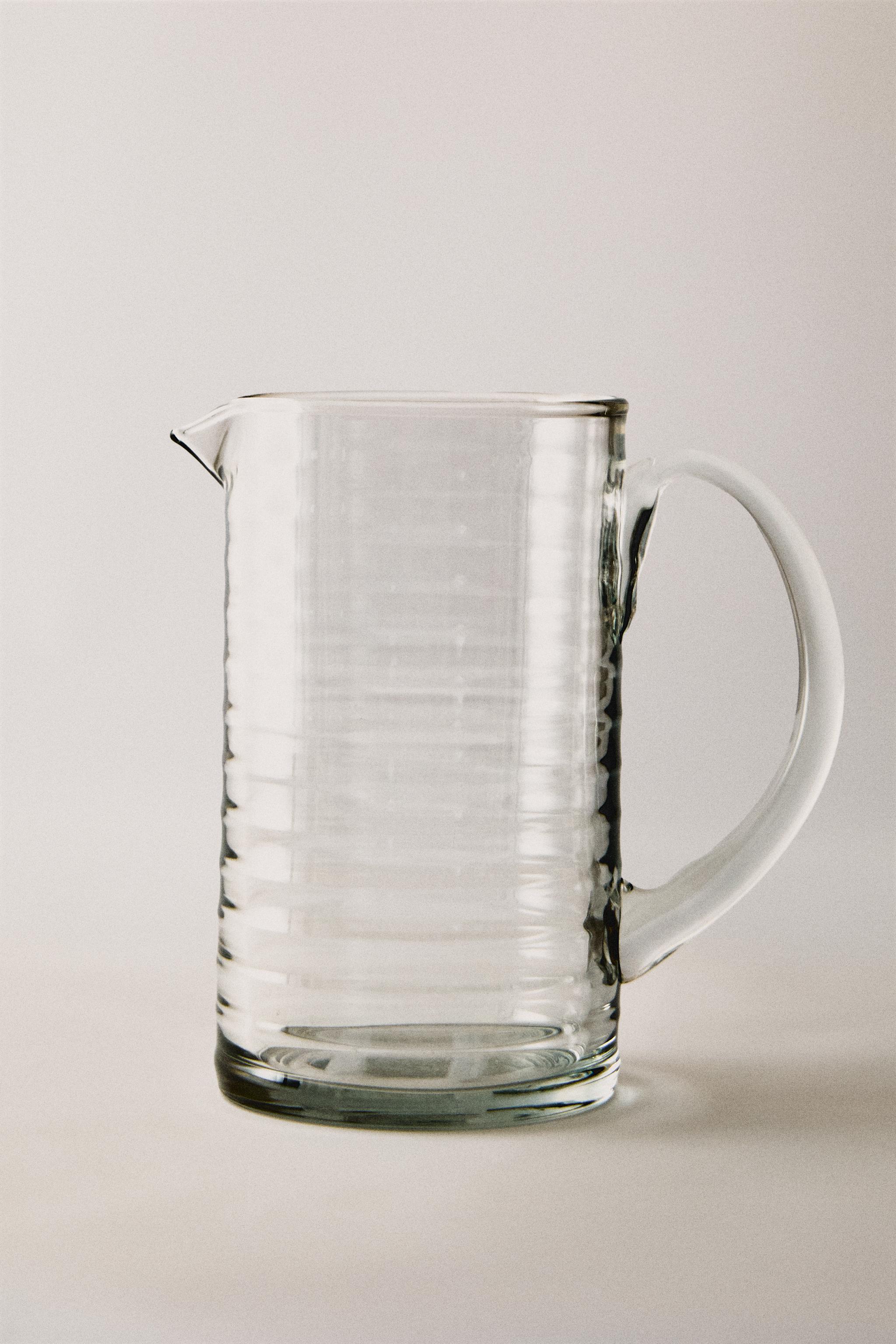 GLASS PITCHER WITH RAISED LINES